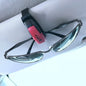 TYPER. Clip-soporte de automóvil para gafas de sol.
